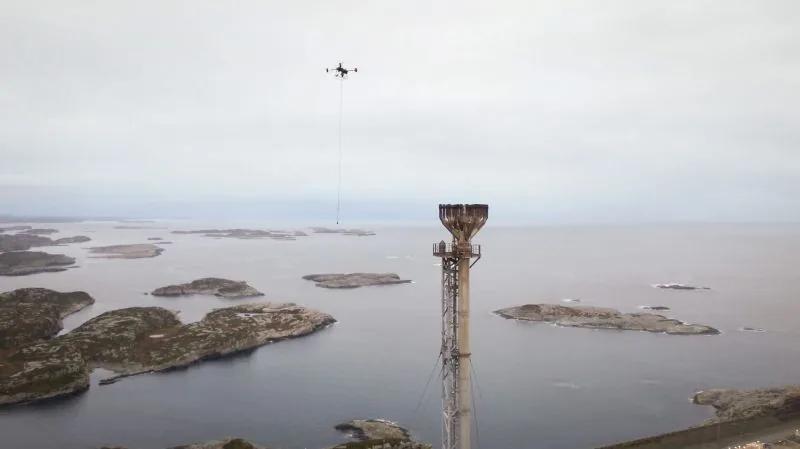 Drone approaching flare tip at an onshore facility for object removal