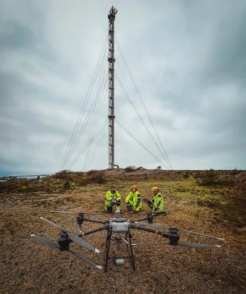 Drone cargo lift in progress — falling-object removal from live flare
